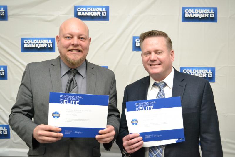 Recognized with the Coldwell Banker International President’s Elite designation, Lee Johnson, left, and Rick Bennett are ranked within the top 5 percent of all Coldwell Banker sales associates worldwide.